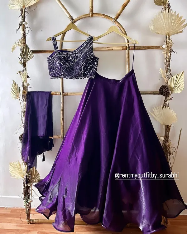 A beautiful purple organza lehenga with a heavily beaded blouse. This is part of my new Indo-Western collection available for rent.
