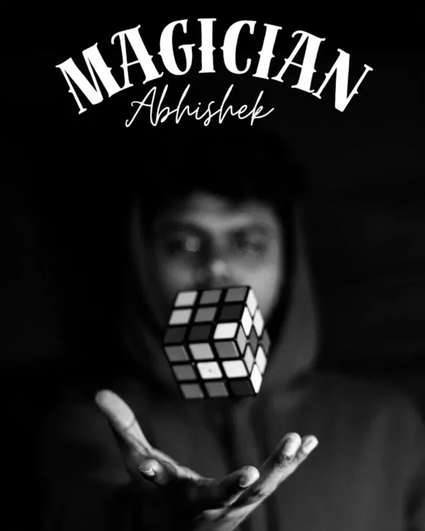 A stylized shot of me with a levitating Rubik's Cube. This is one of my favorite illusions to perform, combining a popular puzzle with a touch of impossible magic.
