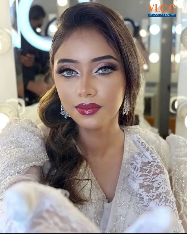 A stunning MET Gala-inspired look created by one of my expert trainers. This showcases the high-fashion artistry you can master, featuring a dramatic cut-crease, bold lips, and a flawless complexion.