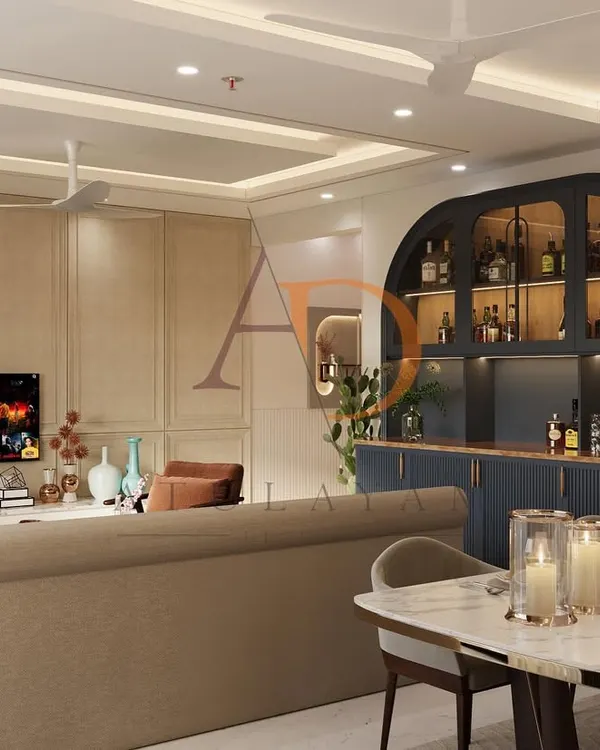 This wide view shows how a bespoke bar unit can be integrated into an open-plan living and dining area, creating distinct zones while maintaining a cohesive and luxurious feel.