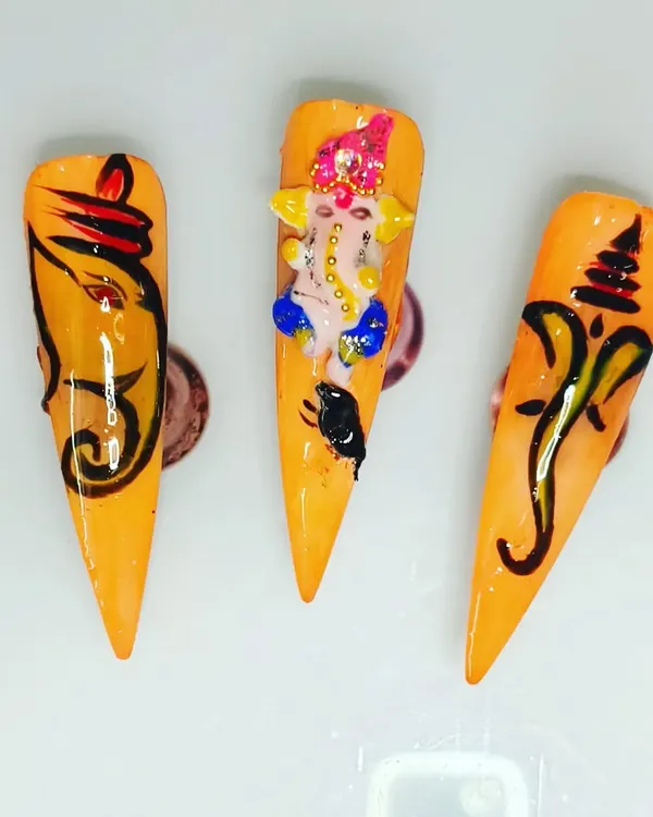 A full view of the Ganesha-themed nail art set. This shows how you can combine 3D elements with detailed free-hand painting to tell a story across the nails.