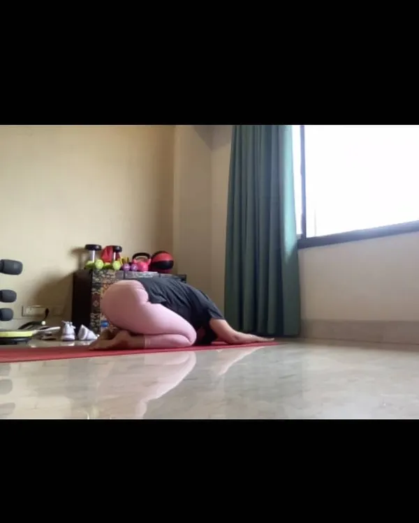This is my setup for an online training session. From here, I guide clients through live yoga flows and workouts, offering personalized feedback right from the comfort of their home.