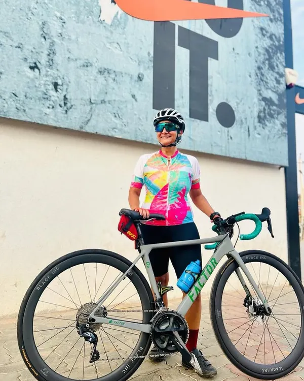 Our custom cycling apparel is designed to stand out, just like our riders. Here's our vibrant 2023 Summer edition jersey, a perfect blend of performance and style, seen against a motivational backdrop that captures our 'Just Ride' spirit.