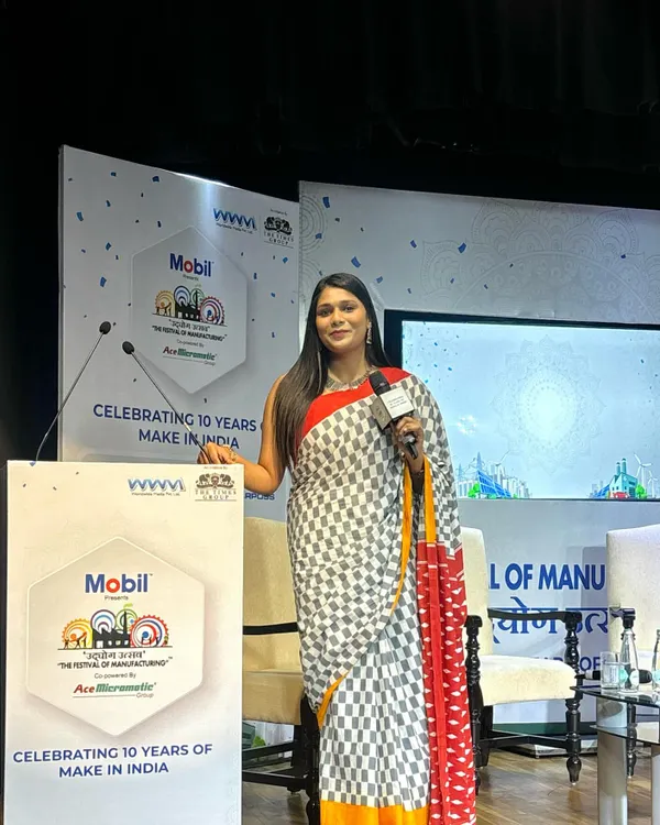 On stage hosting the 10-year celebration of 'Make in India', a flagship initiative of the Government of India. I am honored to be a part of events that celebrate our nation's progress.