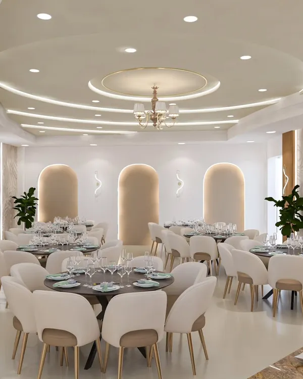 A view of the banquet hall showcasing the arched wall niches and clean, open layout. This design provides a sophisticated canvas that can be customized for weddings, corporate events, and other large gatherings.