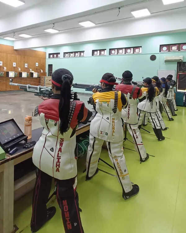 Our women athletes in a synchronized line of fire at our Vashi Centre. This image captures the intense focus and discipline instilled during our training sessions as they prepare for national competitions.