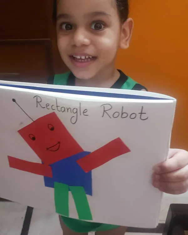 I love seeing the proud smile on a child's face after they complete a project. We made this 'Rectangle Robot' to learn about shapes in a creative way, showing how everyday objects are made of simple geometric forms. This is a key part of our general knowledge curriculum.