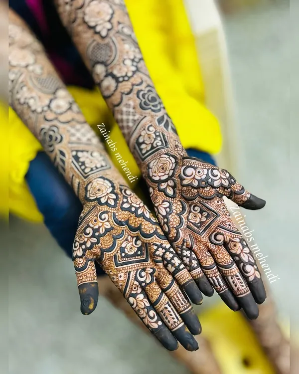 A perfect example of my fusion style. The bold, dark floral outlines are filled with delicate, traditional Pakistani patterns, creating a beautiful contrast.