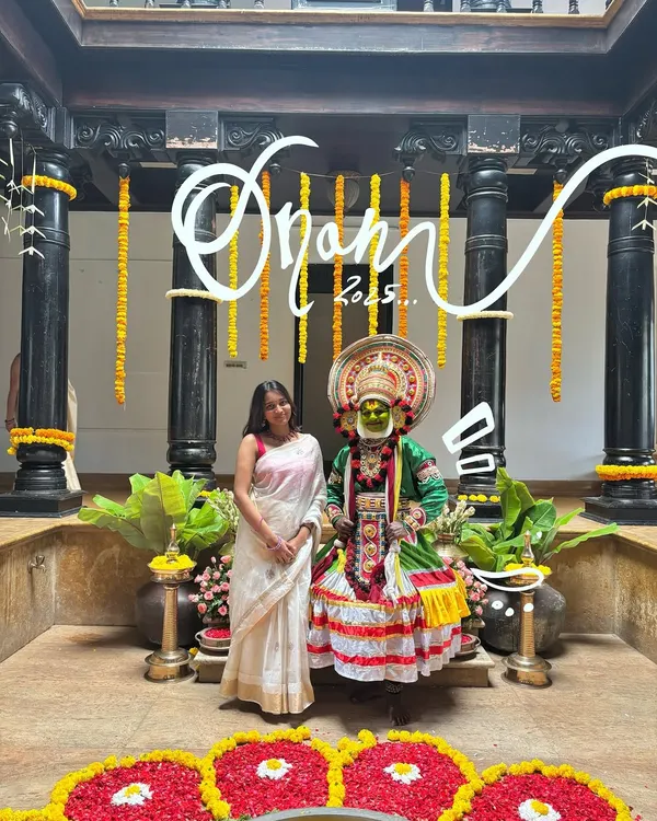 Celebrating Onam 2023. I added some elegant white script to this photo with a Kathakali dancer to mark the special occasion.