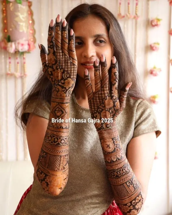 A full bridal mehendi, showcasing elegance woven in tradition. Every swirl, motif, and stroke on her hands tells a timeless tale of love and culture, handcrafted to add the perfect charm to her special moments.