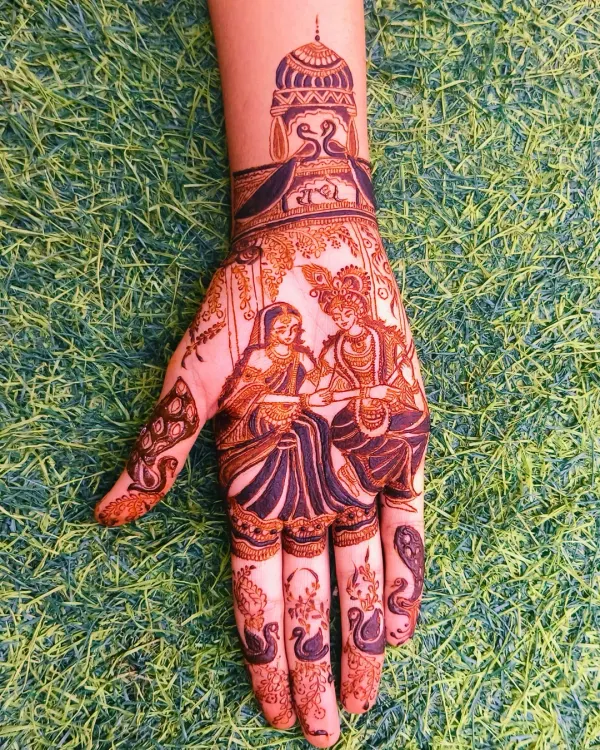 A beautiful portrait of Radha and Krishna sitting together, perfect for Janmashtami or a wedding. The details in their clothing and the serene expression on their faces are the highlights of this design.