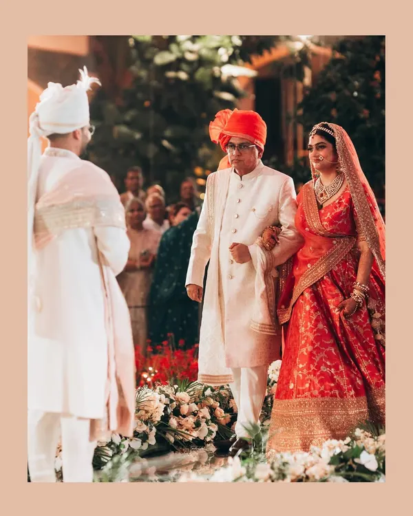 The bride's father walks her down the aisle. This is one of the most emotional moments of any wedding, and I focus on capturing the mix of pride, love, and nostalgia.