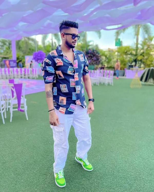 Dressed for a wedding carnival in Nashik. I match my style to your event's theme, bringing a cool, relaxed vibe for daytime parties and poolside celebrations.
