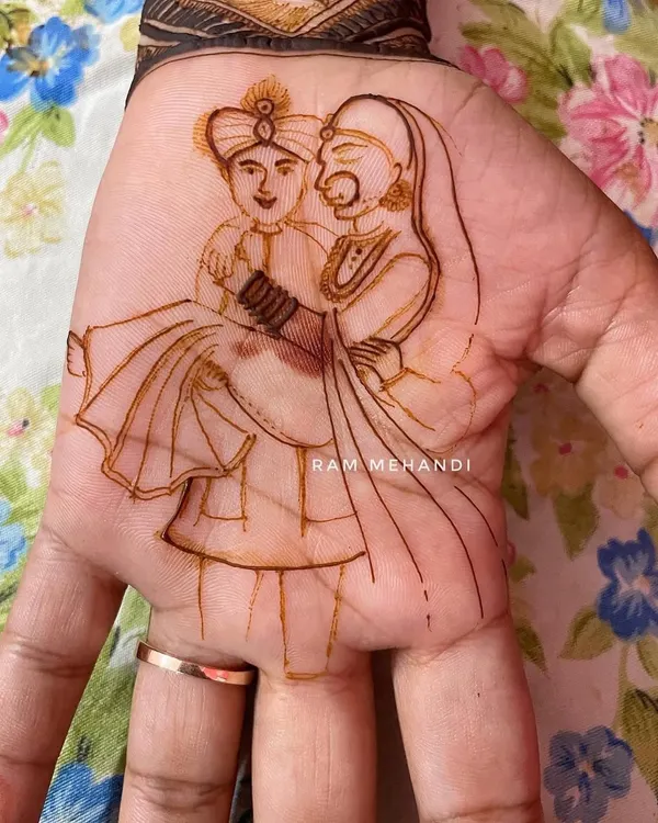 The first step in creating a portrait. This is the clean, confident outline of a groom carrying his bride, which serves as the foundation for the detailed work to follow.