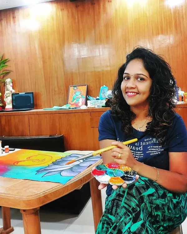 A happy moment in my workspace. With my palette in hand and a canvas in front of me, I feel most like myself. For me, painting is a source of joy and a way to connect with others through art.