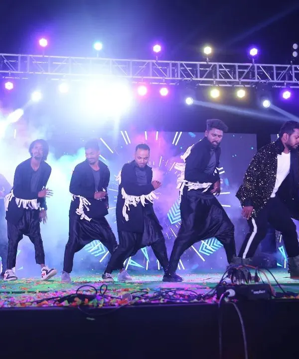 On stage, in the spotlight. This is a glimpse of a professional stage show, showcasing a dynamic group performance with full lighting and effects. I choreograph for events of all scales. 💫