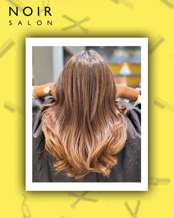 Introducing the colour of the year: Mocha Mousse. This image showcases the rich, sophisticated hue on beautifully styled hair, proving it's a timeless and chic choice for your next hair transformation.