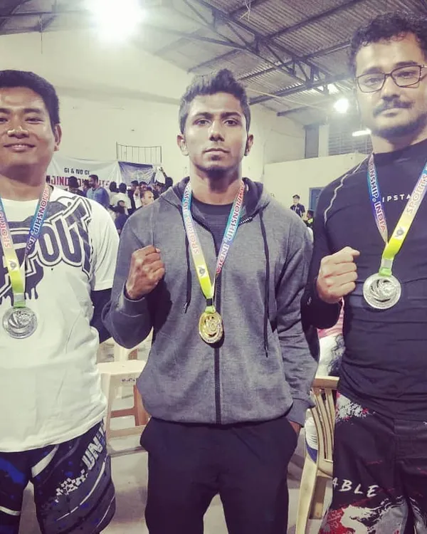 Our fighters on the podium at a national BJJ competition. We brought home two silvers and a gold. It's not about winning, but about how you perform. I'm a proud coach.