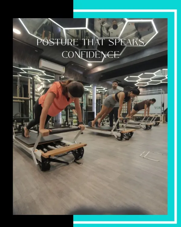 A strong core creates posture that speaks confidence. This group is holding a plank variation on the reformer, a challenging exercise that strengthens the entire core musculature.