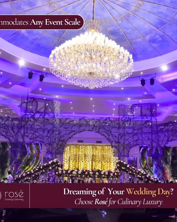 A breathtaking view of a grand wedding venue we catered. The magnificent chandelier and lavish decor show that we can accommodate any event scale, from intimate gatherings to the most opulent celebrations.