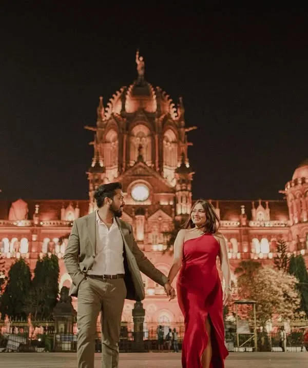 This is what a high-fashion, editorial shoot looks like against the stunning backdrop of Mumbai's CST station at night. We can create these cinematic moments for you.