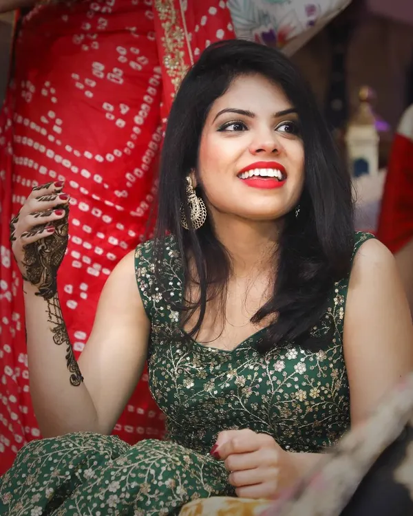 I love capturing these unposed, joyful moments during wedding celebrations. This candid portrait from a sangeet night shows the genuine happiness that makes event photography so special.