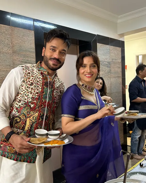 I love it when the stars align at my events. Here are the amazing Ankita Lokhande and Vicky Jain enjoying our festive spread. I bring that celebrity-approved vibe to every party, making sure your celebration is nothing short of spectacular.