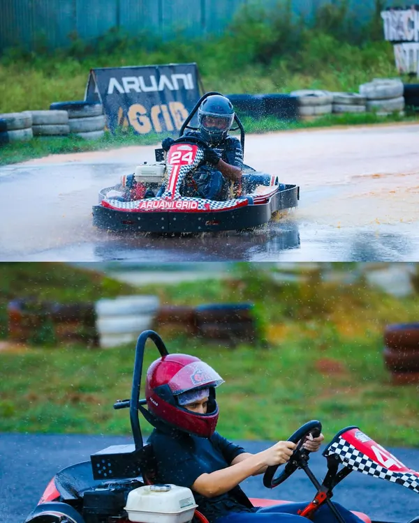 Racing in the rain is a true test of skill. Here you can see our drivers navigating the slippery conditions, focused and ready for the challenge.