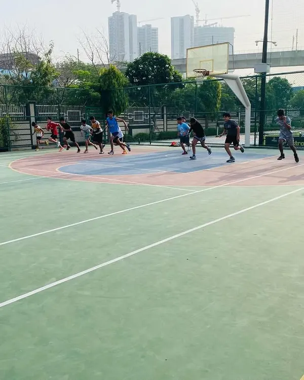The entire group participates in running drills to build cardiovascular endurance.