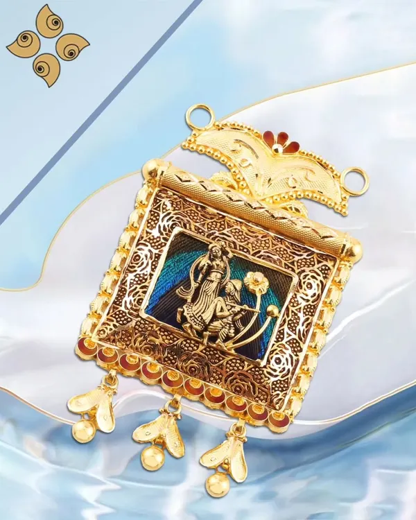 An intricate gold pendant featuring a traditional motif with delicate enamel work. This piece is a perfect example of our detailed craftsmanship and artistic design.