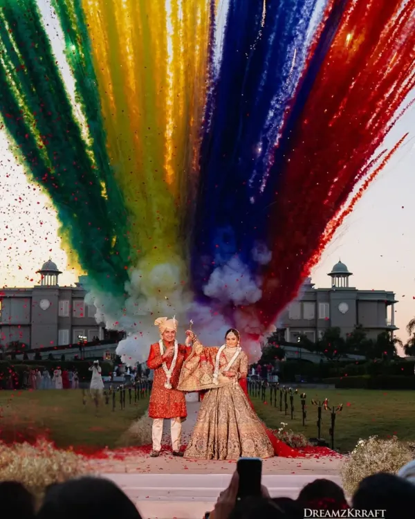 A burst of color against the majestic palace lawns for a varmala moment that was as spectacular as it was heartfelt. We believe in creating visual spectacles that feel unforgettable, using precision-timed pyrotechnics and confetti to match the grandeur of the setting.