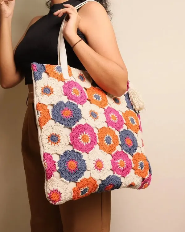 This is my most popular Bohemian tote bag, and you can see why. It’s large enough for daily use and the vibrant colors make any outfit pop. I designed it to be the perfect companion for a day out, whether you're going to college or shopping.