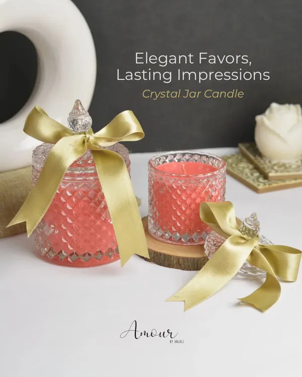 My Crystal Jar Candle is the epitome of elegance for wedding favors. This image showcases the candle's intricate design and luxurious feel, tied with a satin ribbon. It's a favor that guests will cherish long after your special day.