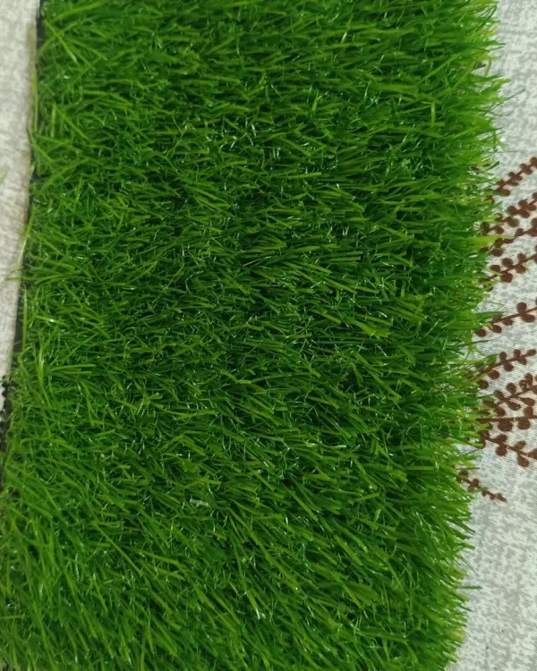 This is my 50mm turf with a 3-tone color blend and double backing. It's a thick, premium option that feels very soft and looks like a well-maintained natural lawn.