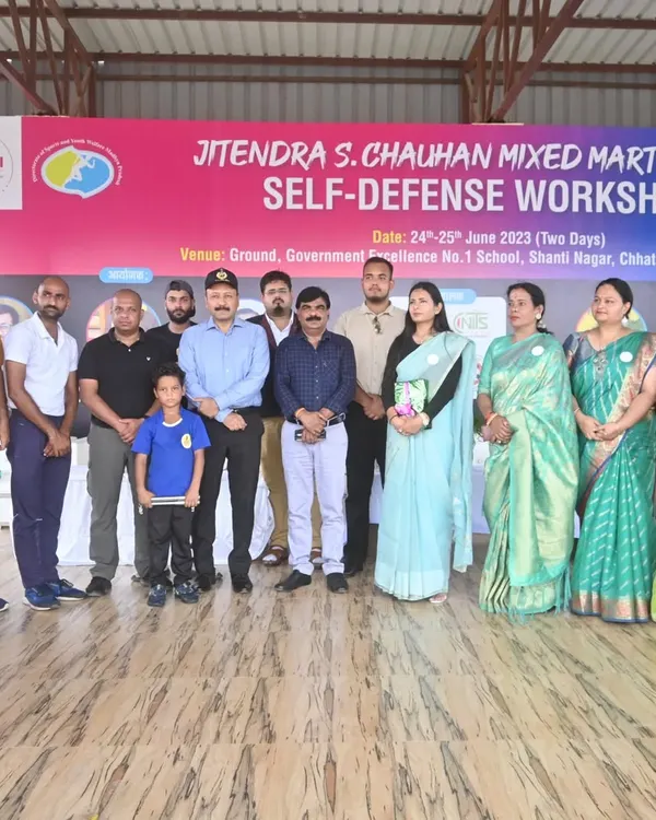 Posing with esteemed members of the organizing team for the JSC Mixed Martial Arts for Self-Defense workshop.