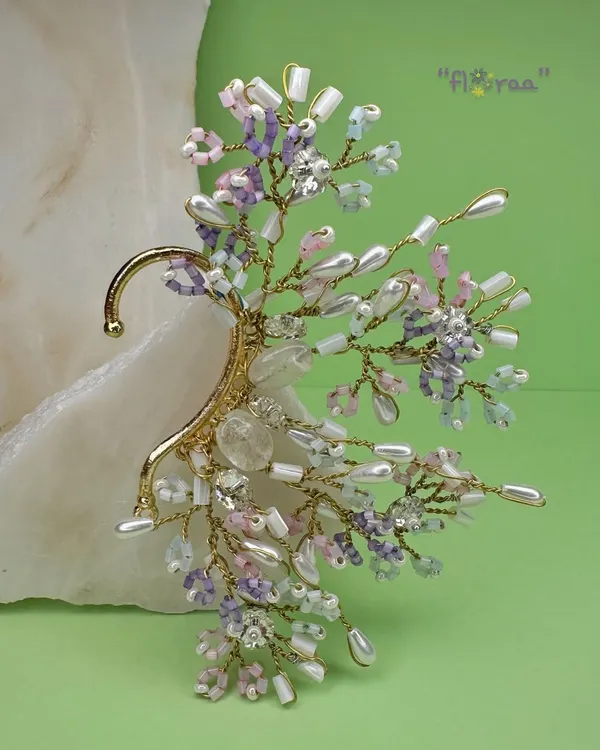 A fun cuff from my FLORAA collection. This piece is crafted with soft-hued crystal beads and freshwater pearls for an edgy brunch look.