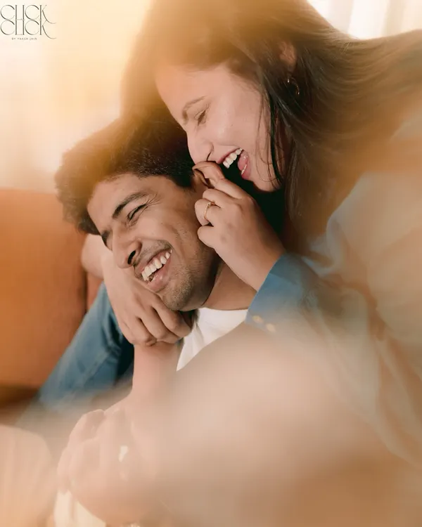 A moment of pure, unscripted laughter during a cozy studio shoot. This is what it's all about: forgetting the camera and just enjoying each other.