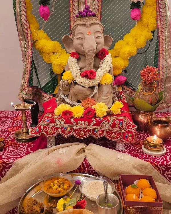 This is the most magical moment for me, seeing the Ganesha idol I sculpted find his place in a home, surrounded by love and prayers. Creating these eco-friendly clay idols is a spiritual journey I cherish every year.