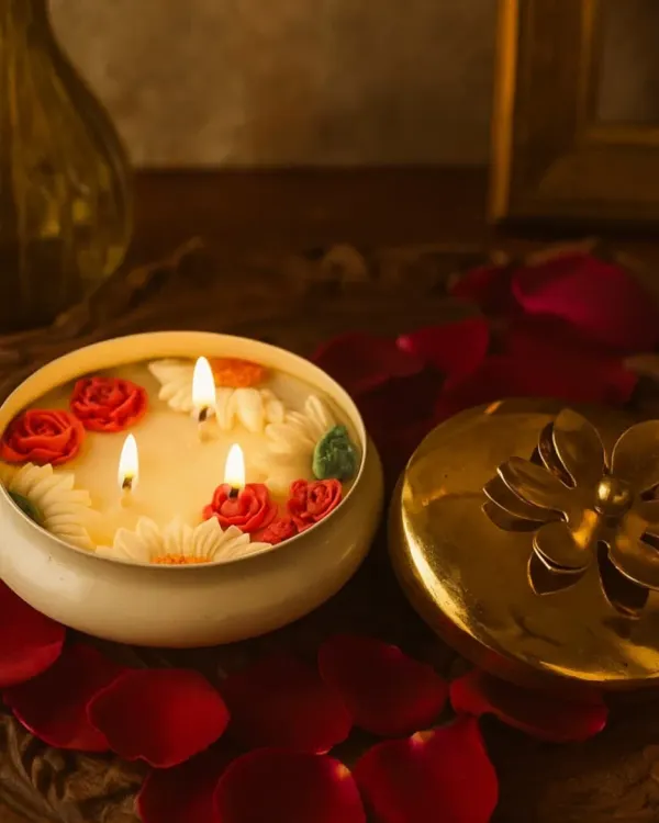 This is the feeling I strive to create with every candle I pour. A moment of pure magic, captured in the warm glow of our handcrafted Urli Candle, adorned with delicate wax roses and daisies. It's perfect for making any evening feel special.
