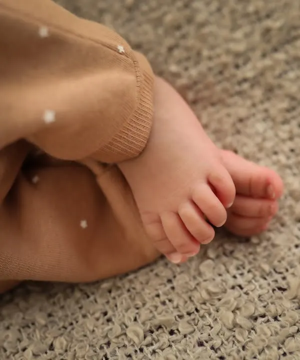 Those perfect little baby feet. I love capturing these tiny details that change so quickly. You'll miss these days.