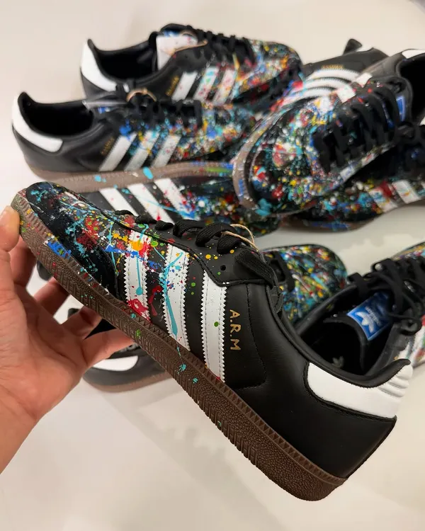 A close-up of one of the nine pairs of custom "Samba Splatter" sneakers I made for a private client. Each one has a unique splatter pattern, making it a true one-of-one.