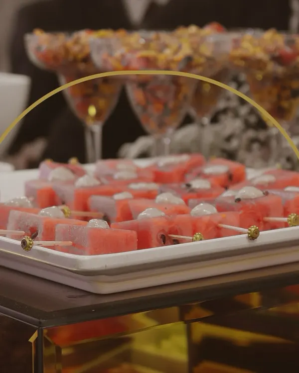 A platter of refreshing watermelon and feta skewers. This light and elegant dessert is a perfect, healthy option for a sophisticated palate.