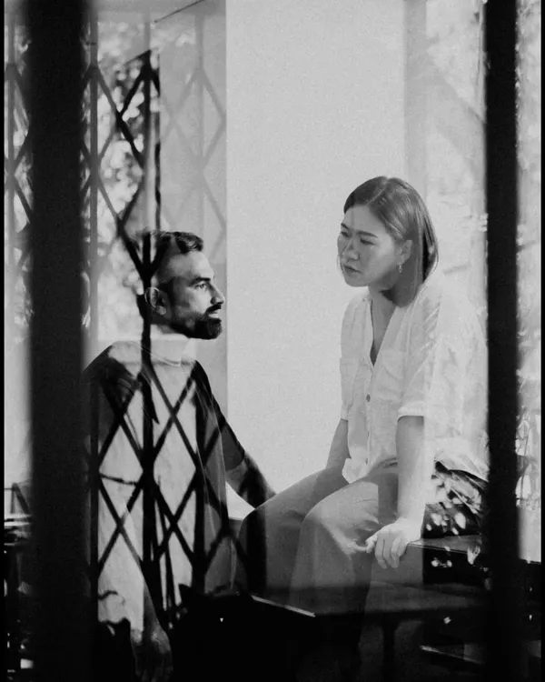 A photo from an article about our journey. It captures a quiet moment between me and my husband, Vinesh. We've built this dream together, and it's a story of passion and partnership.