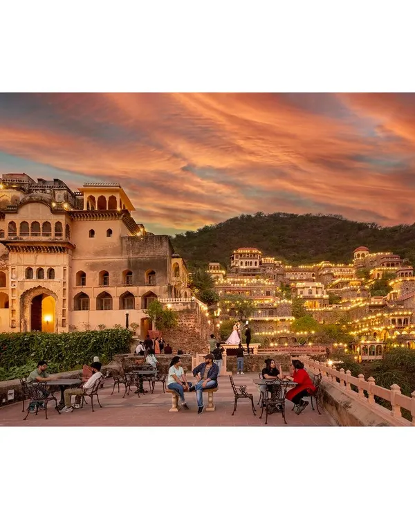 A twilight photograph of the Neemrana Fort-Palace, designed to evoke a sense of wonder. This is a key shot from my architectural photography portfolio, emphasizing the property's grandeur.
