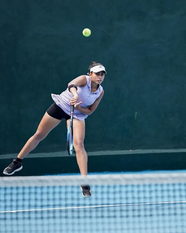 A glimpse into the dedication it takes to build a powerful serve. Here, one of our high-performance players executes a jump serve during a training session on our covered hard courts, demonstrating the explosive technique we cultivate.
