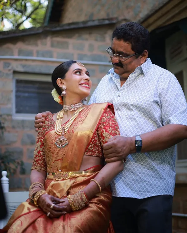 A heartwarming moment between the bride and her father. It's a privilege to witness these special family moments while ensuring the bride looks and feels her absolute best.