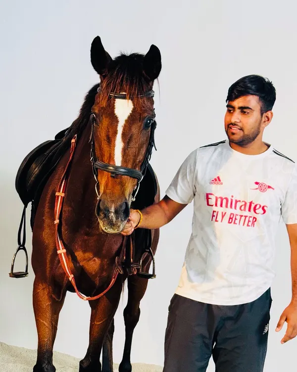 A quiet moment with our competition horse, Candy. We believe a strong, respectful bond with the horse is the most important part of being an equestrian.