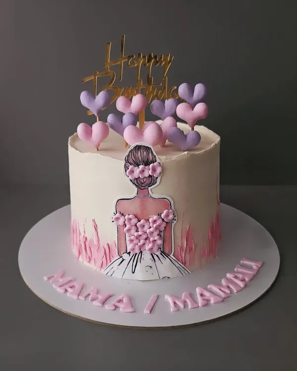 Elegance in pink. A pretty cake for her, whether it's for a wife, mother, or girlfriend. This design features a beautiful illustration and fondant hearts.