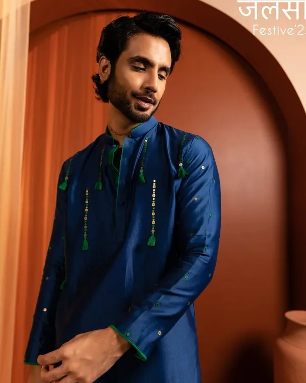 A clean and natural grooming look for a Kaaj Button Studio campaign. The focus is on evening out the skin tone and defining features subtly for a polished finish.