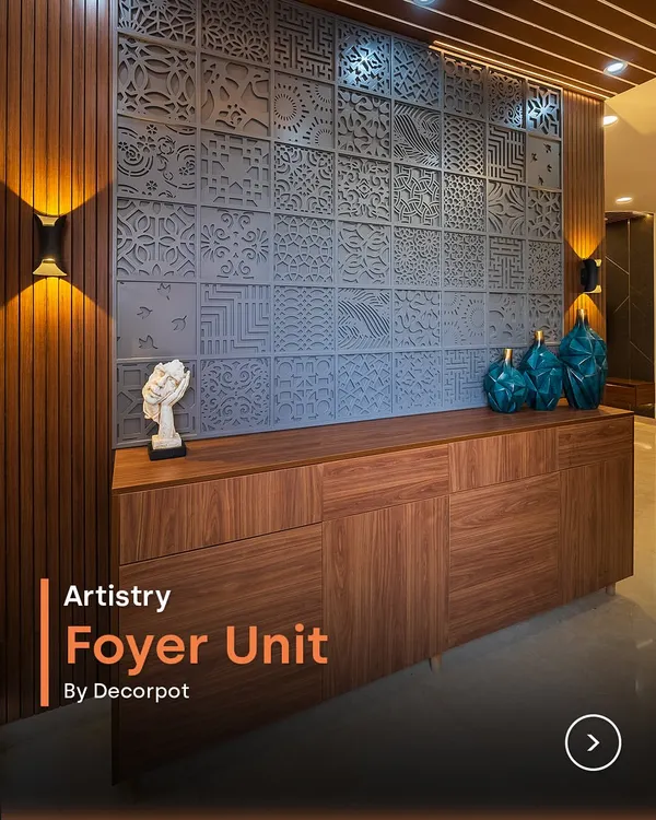This artistry foyer unit is a true masterpiece. The intricate CNC-cut panel wall serves as a stunning backdrop for the warm wood console, creating a sophisticated and welcoming first impression.